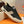PRA TRAINER IN BLACK CALFSKIN AND TAN EMBROIDERED FABRIC