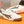 PRA SNEAKER IN WHITE CALFSKIN WITH BLACK AND YELLOW STRIPED