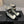 CC Short Boots 45mm In White Mix Black Quilted Lambskin And Glossy Cowhide 950036
