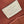 HAND IT ALL MM 32 IN CREAM MONOGRAM PERFORATE CALFSKIN SILVER HARDWARE