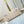 HAND IT ALL PM 29 IN BEIGE MONOGRAM PERFORATE CALFSKIN SILVER HARDWARE