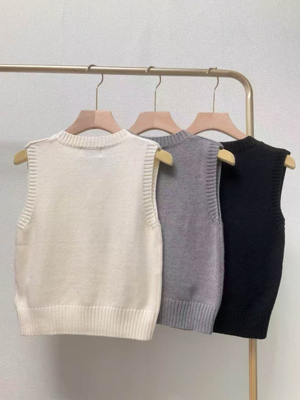 Gilet lavorato a maglia con scollo a V e paillettes a coste CC