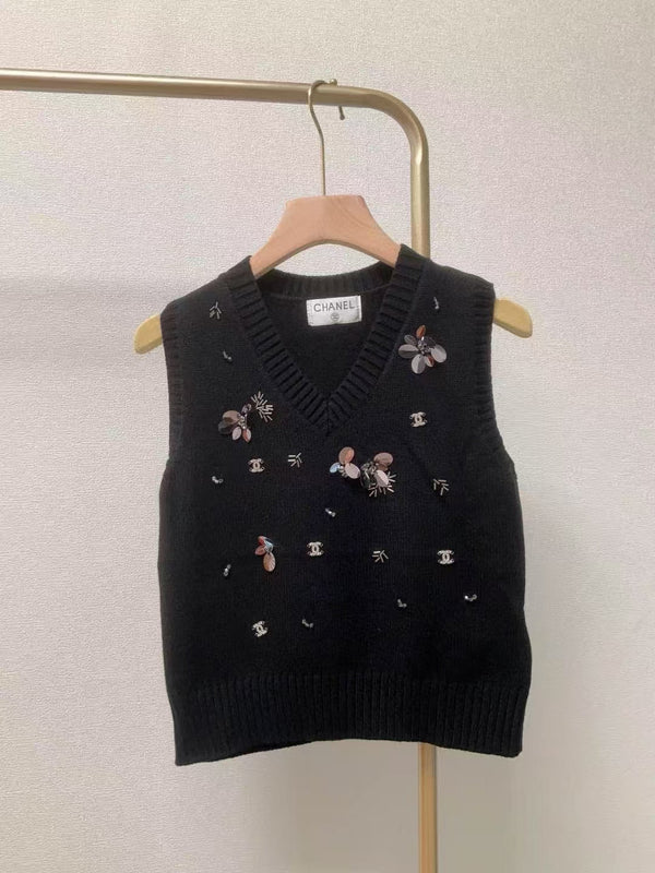 Gilet lavorato a maglia con scollo a V e paillettes a coste CC
