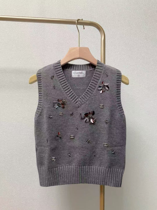 Gilet lavorato a maglia con scollo a V e paillettes a coste CC