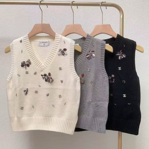 Gilet lavorato a maglia con scollo a V e paillettes a coste CC