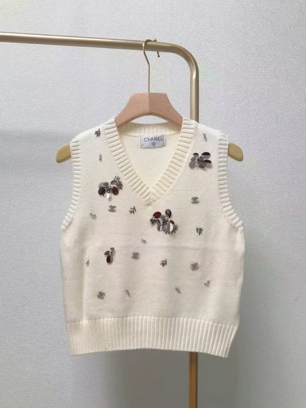 Gilet lavorato a maglia con scollo a V e paillettes a coste CC