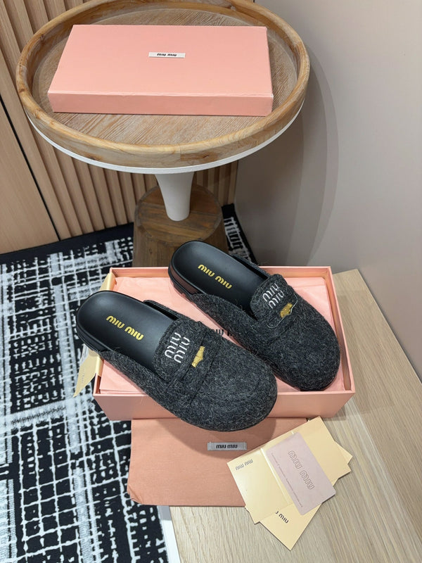 Miu slippers Black Original Wool