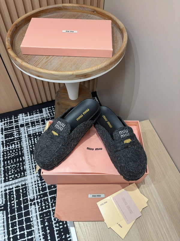 Miu slippers Black Original Wool