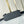 MESSENGER VOYAGER PM 33 IN GUN METAL MONOGRAM ECLIPSE CANVAS