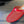 Alaia 25 Fishnet Flat Mules Red Lampskin 303682
