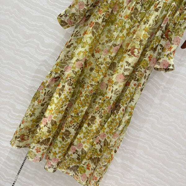 Abito Celine in seta verde con motivo floreale