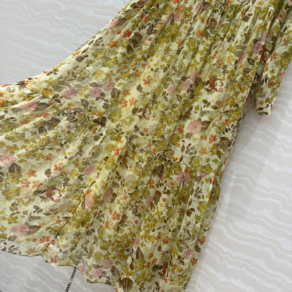 Abito Celine in seta verde con motivo floreale