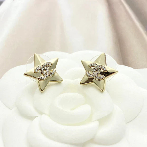 Boucles d'oreilles étoiles Double C Or clair CC