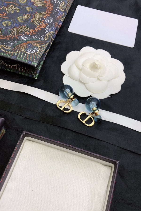 ORECCHINI IN ORO BLU CON PERLA CD