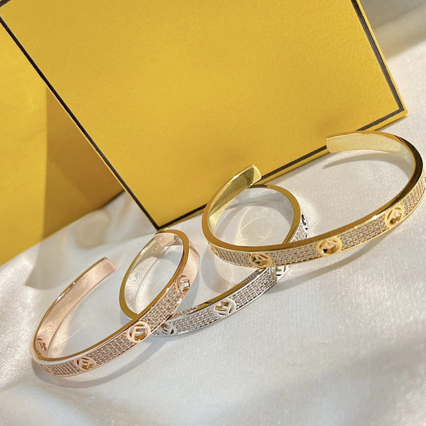 F BRACCIALE IN ORO ROSA CON DIAMANTI