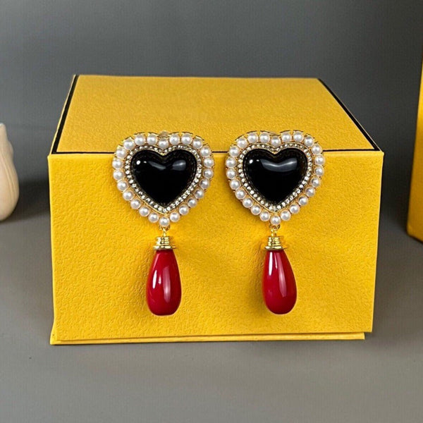 ORECCHINI IN ORO CON PERLA A CUORE F