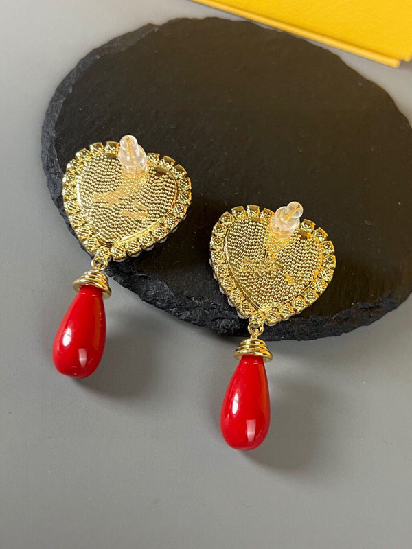 ORECCHINI IN ORO CON PERLA A CUORE F