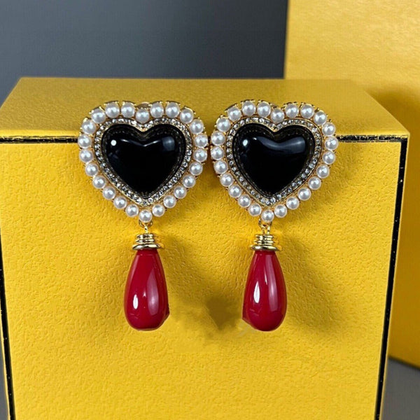 ORECCHINI IN ORO CON PERLA A CUORE F