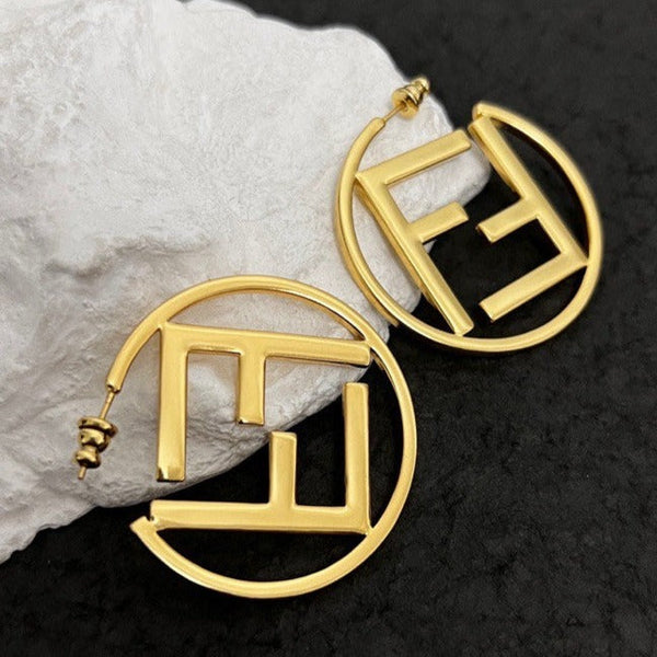 ORECCHINI IN ORO DOPPIA F