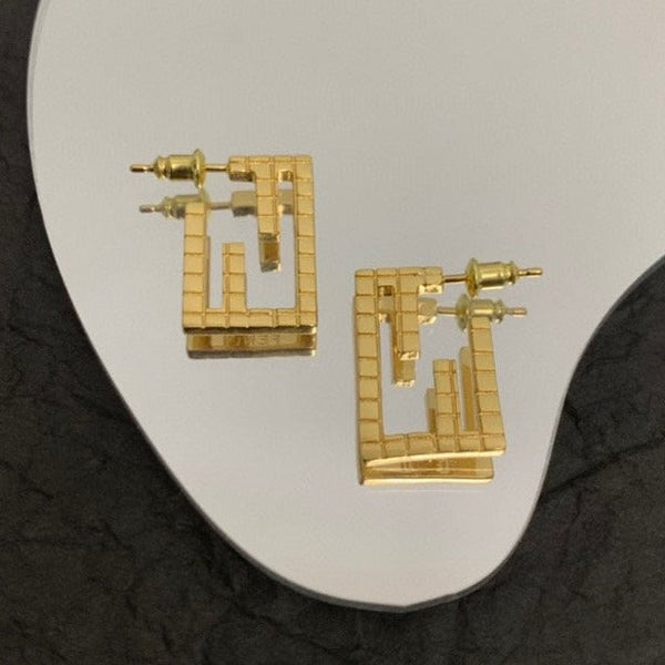 ORECCHINI IN ORO A FORMA DI MOTIVO BAGUETTE FF