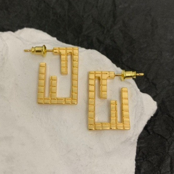 ORECCHINI IN ORO A FORMA DI MOTIVO BAGUETTE FF