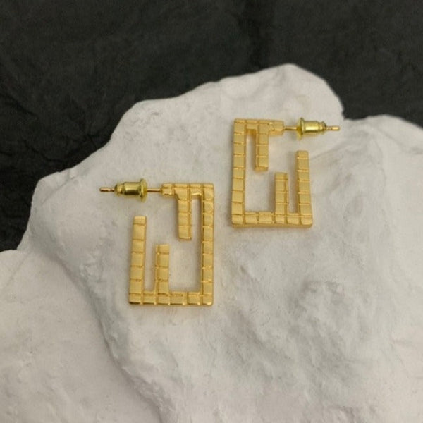 ORECCHINI IN ORO A FORMA DI MOTIVO BAGUETTE FF