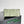 BV SMALL BRICK 24CM PELLE DI AGNELLO VERDE CHIARO 
