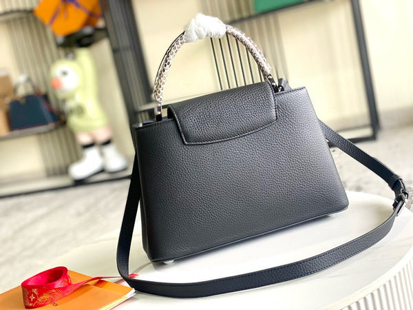 Borsa Capucines in pelle di vitello nera con manico superiore e serpente, versione migliore