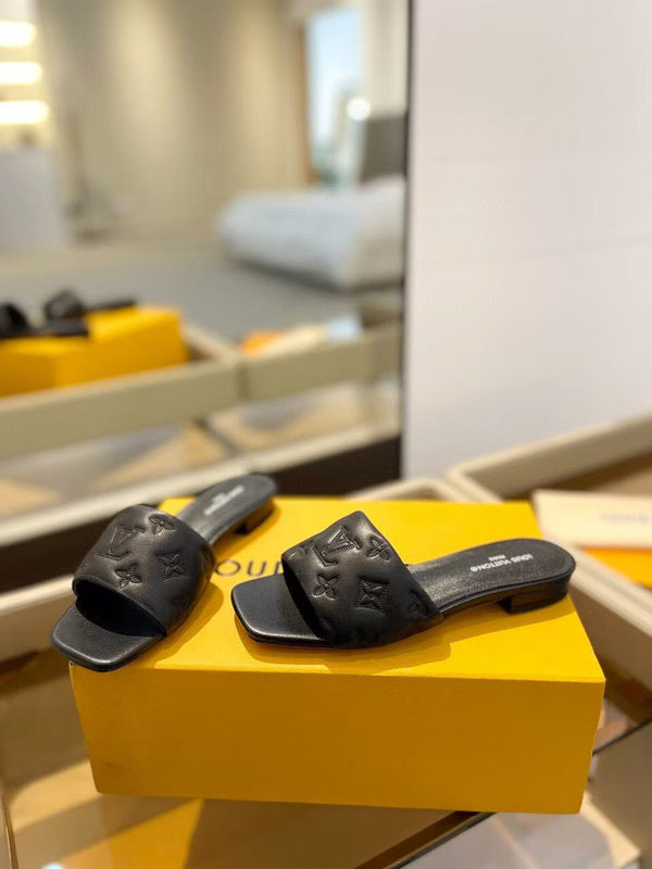 LV Neo Revival Mule Flat Nero Logo in rilievo Pelle bovina