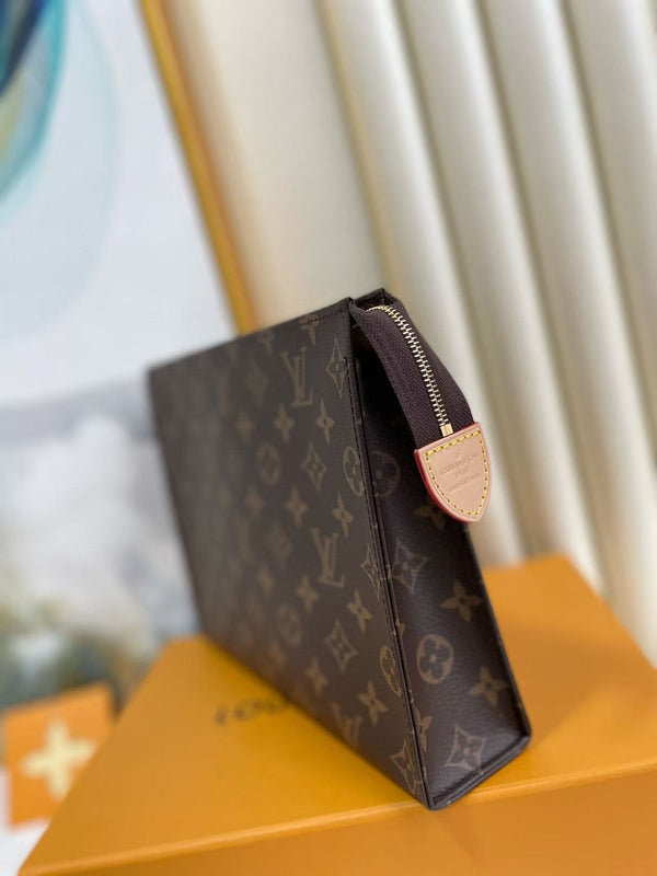 Pochette da toilette LV 26 cm in tela monogramma marrone e pelle