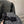 Veste en tweed noir Chanel 2025 à quatre poches et bordure en velours