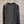 Veste en tweed noir Chanel 2025 à quatre poches et bordure en velours