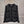 Veste en tweed noir Chanel 2025 à quatre poches et bordure en velours