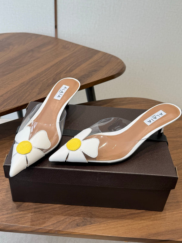 Alaia Round Flower Mules 55mm Cowhide Clear PVC 889940