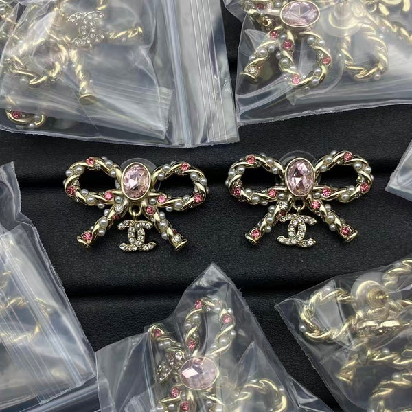 Boucles d'oreilles nœud en ruban CC Chanel