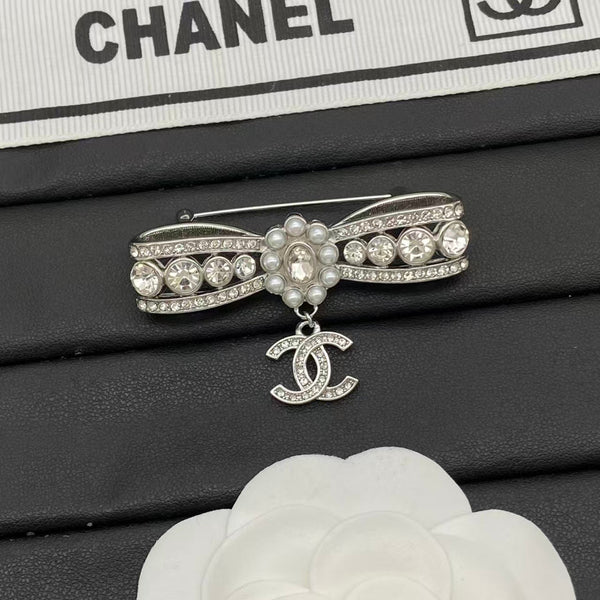Chanel Bow Brooch with CC Pendant