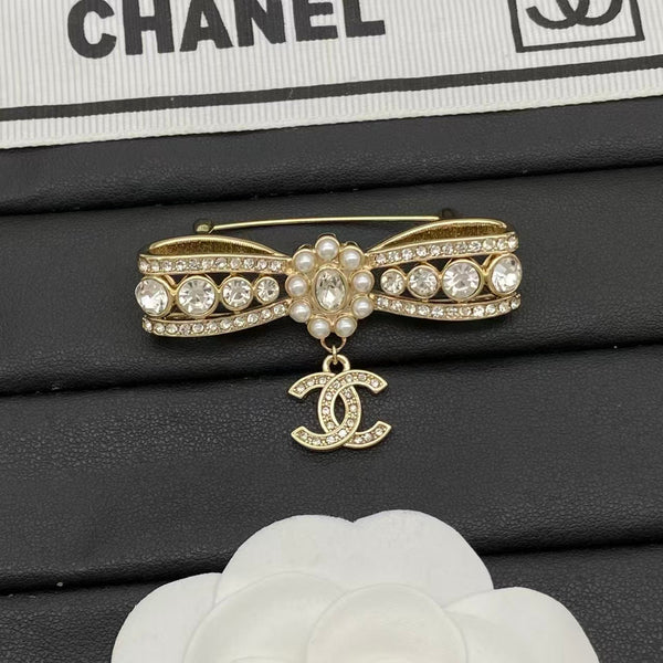 Chanel Bow Brooch with CC Pendant