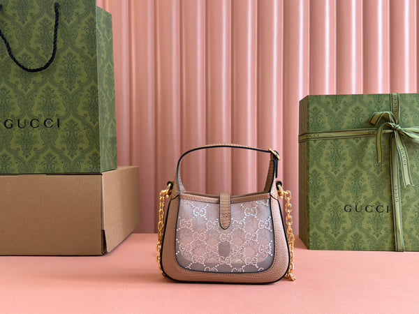 Sac GG Jackie Mini en cuir de lézard rose orné de cristaux 675799