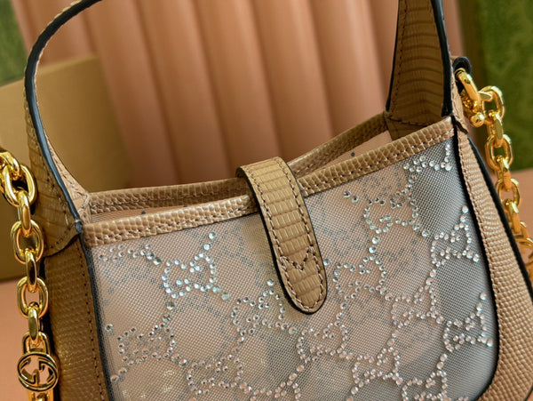 Sac GG Jackie Mini en cuir de lézard rose orné de cristaux 675799