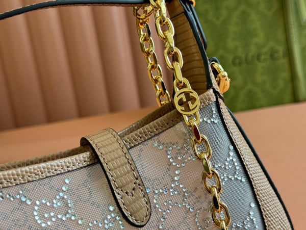 Sac GG Jackie Mini en cuir de lézard rose orné de cristaux 675799