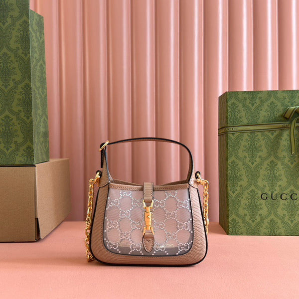 Sac GG Jackie Mini en cuir de lézard rose orné de cristaux 675799