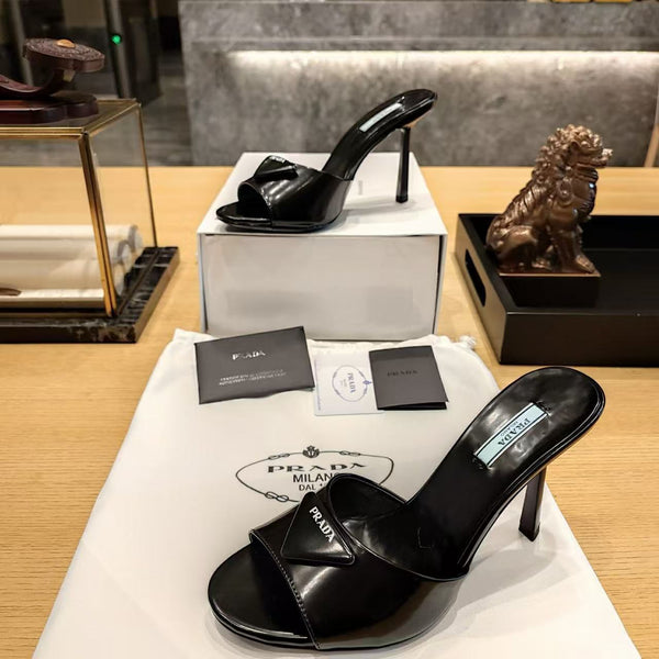 Prad 26s Open Toe Mules 100mm In Black Patent Calfskin With Logo