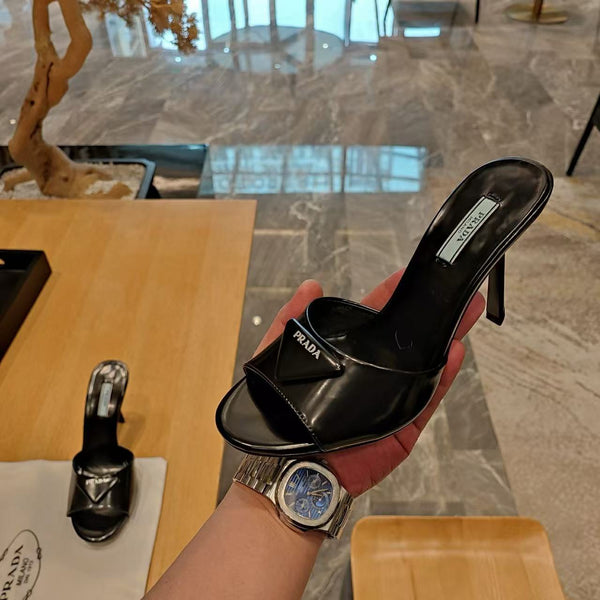 Prad 26s Open Toe Mules 100mm In Black Patent Calfskin With Logo