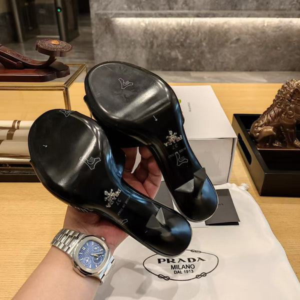 Prad 26s Open Toe Mules 100mm In Black Patent Calfskin With Logo