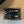 Mules plates Alaia 25 Infradito Fishnet en cuir d'agneau noir 303708