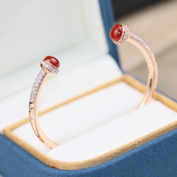 BRACCIALE APERTO IN ORO ROSA CON DIAMANTI E CORNIOLA POSSESSION 