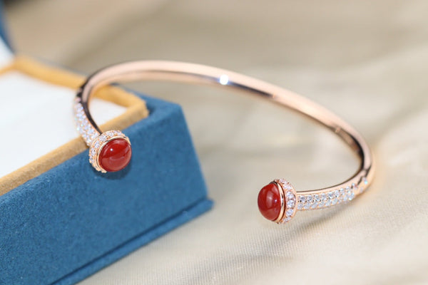 BRACCIALE APERTO IN ORO ROSA CON DIAMANTI E CORNIOLA POSSESSION 