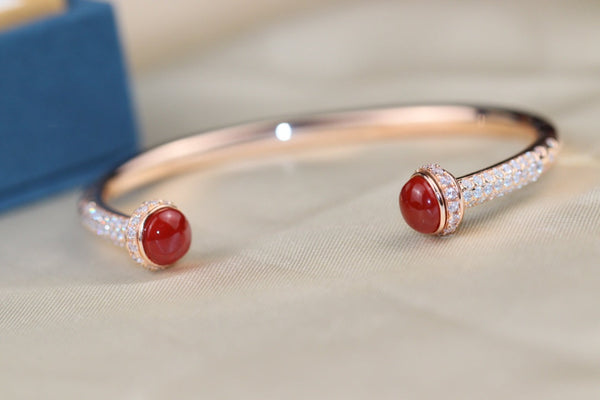 BRACCIALE APERTO IN ORO ROSA CON DIAMANTI E CORNIOLA POSSESSION 