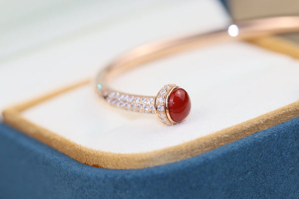 BRACCIALE APERTO IN ORO ROSA CON DIAMANTI E CORNIOLA POSSESSION 
