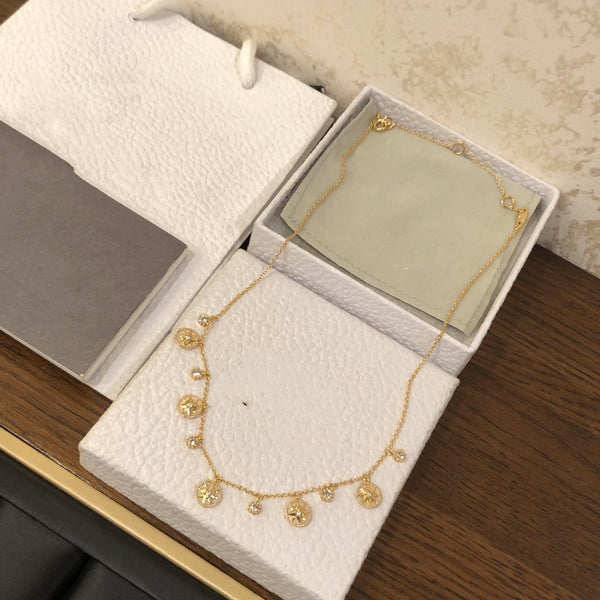COLLANA ROSE DES VENTS ORO GIALLO, DIAMANTI E MADREPERLA